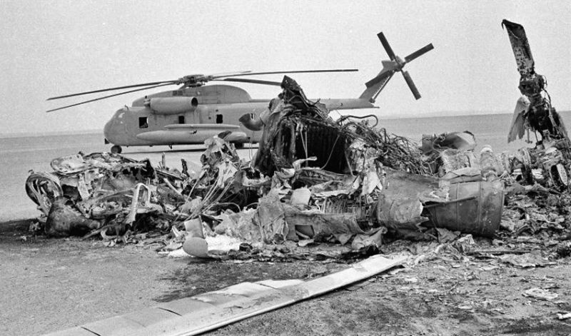 Burned wreckage of a US Navy RH-53D Sea Stallion in the Iranian desert (Author unknown)